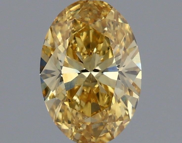 Loose Diamond - OVAL 0.54ct Fancy Vivid Yellow VS1: Loose Diamond - OVAL 0.54ct Fancy Vivid Yellow VS1 Source: This is a real non-mined Diamond that has been grown in a lab Shape: OVAL Carats: 0.54 Color: Fancy Vivid Yellow Certification: IGI Video:
