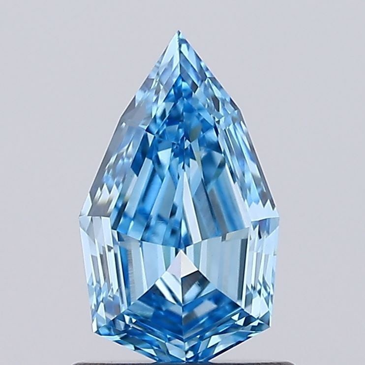 Loose Diamond - OCTAGONAL 0.9ct Fancy Vivid Blue VS1: Loose Diamond - OCTAGONAL 0.9ct Fancy Vivid Blue VS1 Source: This is a real non-mined Diamond that has been grown in a lab Shape: OCTAGONAL Carats: 0.9 Color: Fancy Vivid Blue Certification: IGI Video