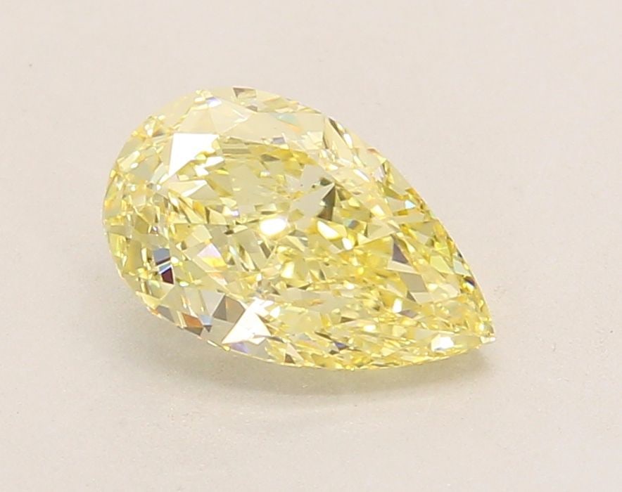 Loose Diamond - PEAR 1.55ct Fancy Yellow VS1: Loose Diamond - PEAR 1.55ct Fancy Yellow VS1 Source: This is a real non-mined Diamond that has been grown in a lab Shape: PEAR Carats: 1.55 Color: Fancy Yellow Certification: IGI Video: