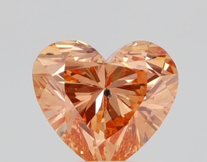 Loose Diamond - HEART 0.8ct Fancy Orange SI2: Loose Diamond - HEART 0.8ct Fancy Orange SI2 Source: This is a real non-mined Diamond that has been grown in a lab Shape: HEART Carats: 0.8 Color: Fancy Orange Certification: NONE Video: