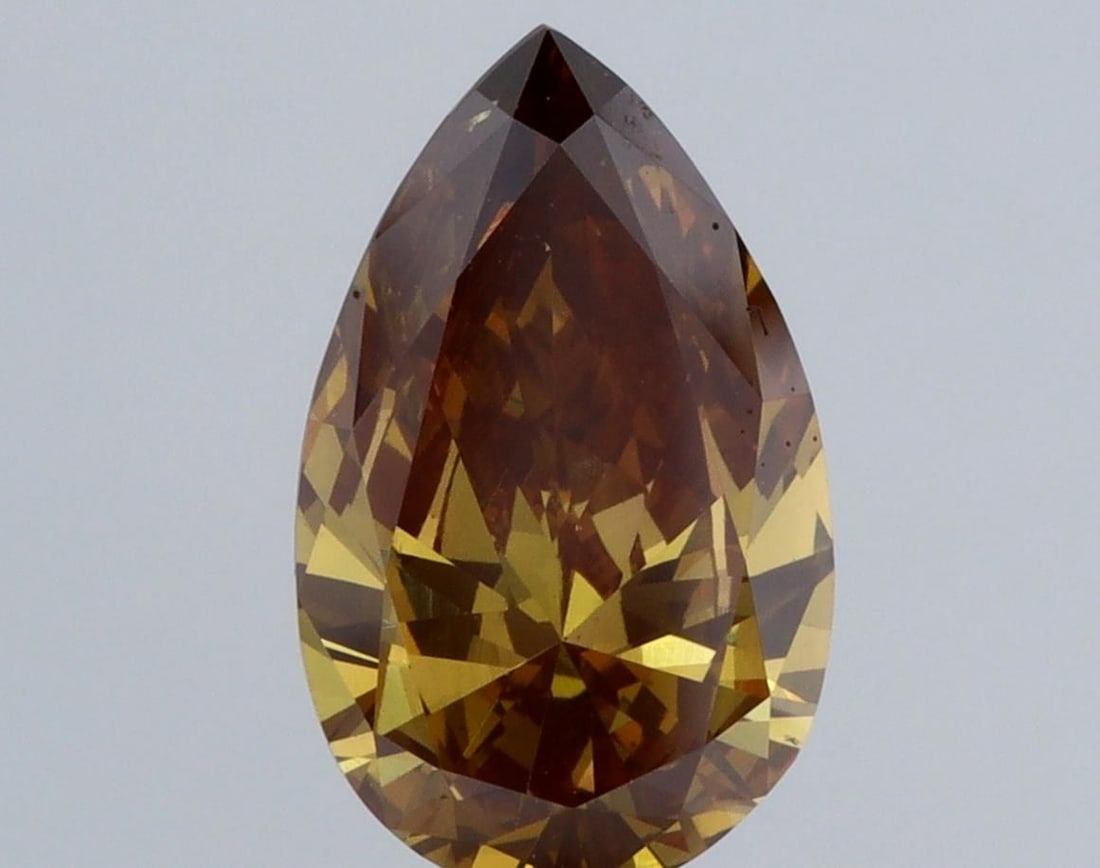 Loose Diamond - PEAR 1.91ct Brown VS2: Loose Diamond - PEAR 1.91ct Brown VS2 Source: This is a real non-mined Diamond that has been grown in a lab Shape: PEAR Carats: 1.91 Color: Brown Certification: NONE Video: