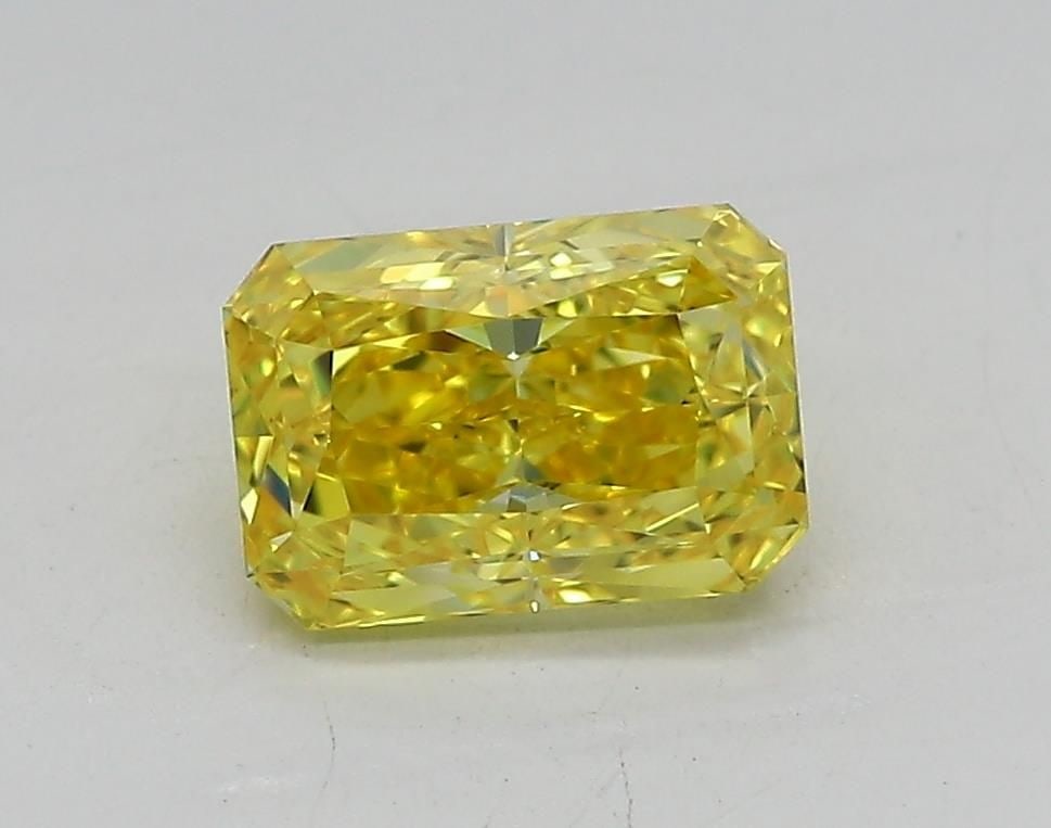 Loose Diamond - RADIANT 1.06ct Fancy Vivid Yellow IF: Loose Diamond - RADIANT 1.06ct Fancy Vivid Yellow IF Source: This is a real non-mined Diamond that has been grown in a lab Shape: RADIANT Carats: 1.06 Color: Fancy Vivid Yellow Certification: IGI Vide
