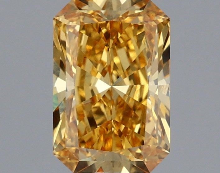 Loose Diamond - RADIANT 1.08ct Fancy Vivid Yellow VS1: Loose Diamond - RADIANT 1.08ct Fancy Vivid Yellow VS1 Source: This is a real non-mined Diamond that has been grown in a lab Shape: RADIANT Carats: 1.08 Color: Fancy Vivid Yellow Certification: IGI Vid