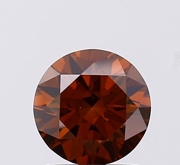 Ideal Loose Diamond - ROUND 1.13ct Fancy Deep Brown VVS2: Ideal Loose Diamond - ROUND 1.13ct Fancy Deep Brown VVS2 Source: This is a real non-mined Diamond that has been grown in a lab Shape: ROUND Carats: 1.13 Color: Fancy Deep Brown Certification: IGI Vide