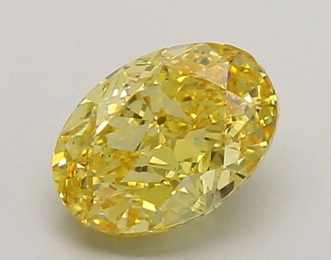 Loose Diamond - OVAL 1.22ct Fancy Vivid Yellow VS2: Loose Diamond - OVAL 1.22ct Fancy Vivid Yellow VS2 Source: This is a real non-mined Diamond that has been grown in a lab Shape: OVAL Carats: 1.22 Color: Fancy Vivid Yellow Certification: IGI Video: