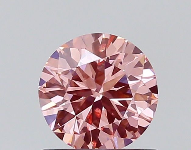 Loose Diamond - ROUND 0.66ct Fancy Vivid Pink SI2: Loose Diamond - ROUND 0.66ct Fancy Vivid Pink SI2 Source: This is a real non-mined Diamond that has been grown in a lab Shape: ROUND Carats: 0.66 Color: Fancy Vivid Pink Certification: NONE The Diamon