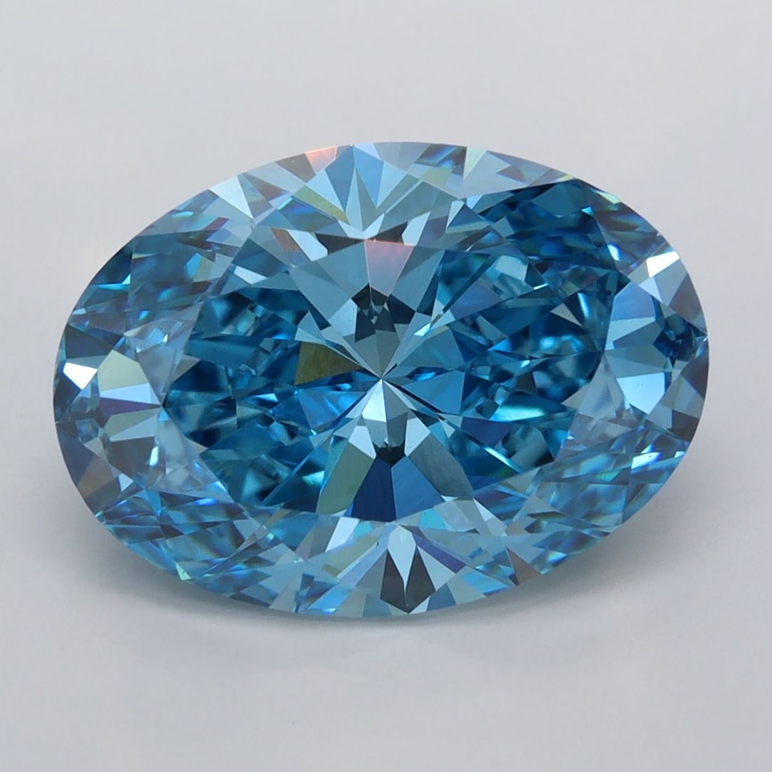Loose Diamond - OVAL 5.06ct Fancy Vivid Blue VVS2: Loose Diamond - OVAL 5.06ct Fancy Vivid Blue VVS2 Source: This is a real non-mined Diamond that has been grown in a lab Shape: OVAL Carats: 5.06 Color: Fancy Vivid Blue Certification: IGI Video: