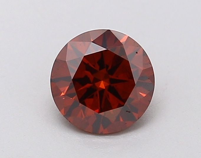Loose Diamond - ROUND 0.45ct Fancy Deep Orange VS2: Loose Diamond - ROUND 0.45ct Fancy Deep Orange VS2 Source: This is a real non-mined Diamond that has been grown in a lab Shape: ROUND Carats: 0.45 Color: Fancy Deep Orange Certification: IGI Video: