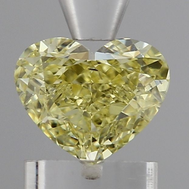 Loose Diamond - HEART 1.02ct Fancy Intense Yellow SI1: Loose Diamond - HEART 1.02ct Fancy Intense Yellow SI1 Source: This is a real non-mined Diamond that has been grown in a lab Shape: HEART Carats: 1.02 Color: Fancy Intense Yellow Certification: IGI Vid