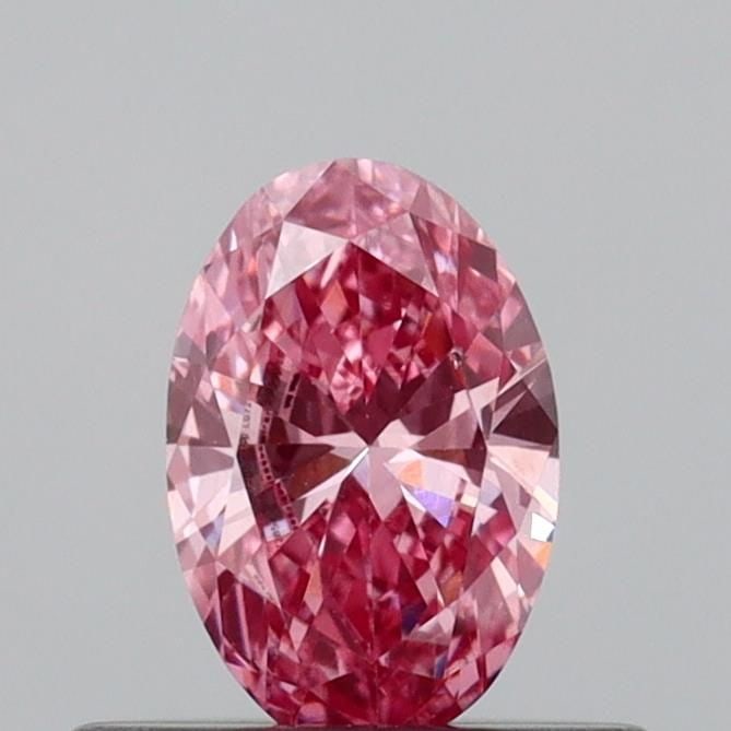 Loose Diamond - OVAL 0.32ct Fancy Vivid Pink VS2: Loose Diamond - OVAL 0.32ct Fancy Vivid Pink VS2 Source: This is a real non-mined Diamond that has been grown in a lab Shape: OVAL Carats: 0.32 Color: Fancy Vivid Pink Certification: IGI Video: