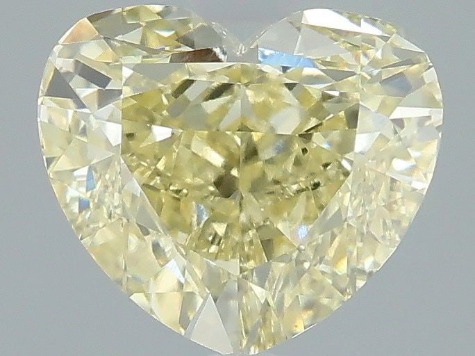 Loose Diamond - HEART 2.51ct Fancy Yellow VVS2: Loose Diamond - HEART 2.51ct Fancy Yellow VVS2 Source: This is a real non-mined Diamond that has been grown in a lab Shape: HEART Carats: 2.51 Color: Fancy Yellow Certification: IGI Video: