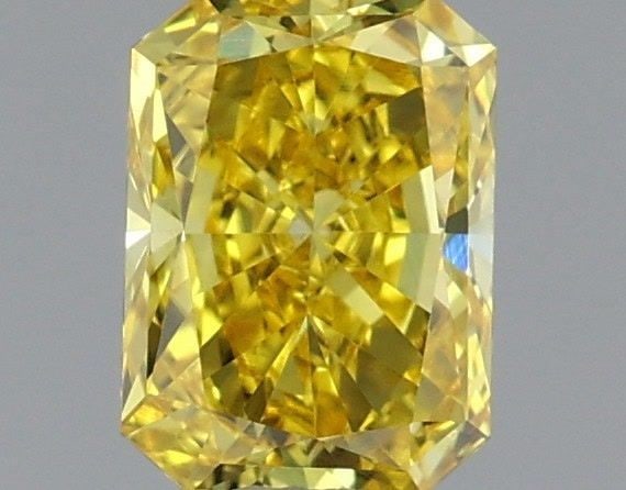 Loose Diamond - RADIANT 0.53ct Fancy Vivid Yellow VVS2: Loose Diamond - RADIANT 0.53ct Fancy Vivid Yellow VVS2 Source: This is a real non-mined Diamond that has been grown in a lab Shape: RADIANT Carats: 0.53 Color: Fancy Vivid Yellow Certification: IGI Vi