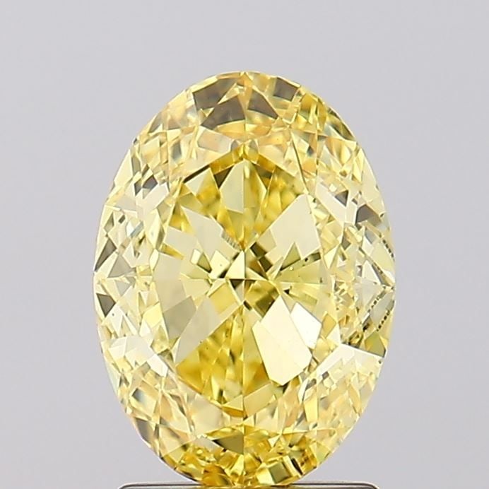 Loose Diamond - OVAL 2.27ct Fancy Vivid Yellow VS1: Loose Diamond - OVAL 2.27ct Fancy Vivid Yellow VS1 Source: This is a real non-mined Diamond that has been grown in a lab Shape: OVAL Carats: 2.27 Color: Fancy Vivid Yellow Certification: IGI Video: