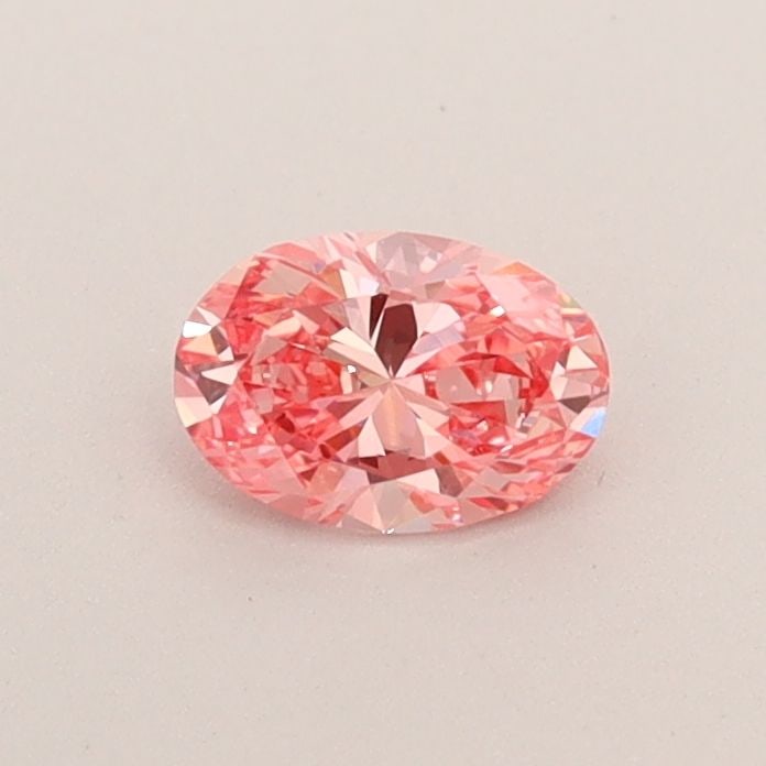 Loose Diamond - OVAL 0.36ct Fancy Vivid Pink VS1: Loose Diamond - OVAL 0.36ct Fancy Vivid Pink VS1 Source: This is a real non-mined Diamond that has been grown in a lab Shape: OVAL Carats: 0.36 Color: Fancy Vivid Pink Certification: IGI Video: