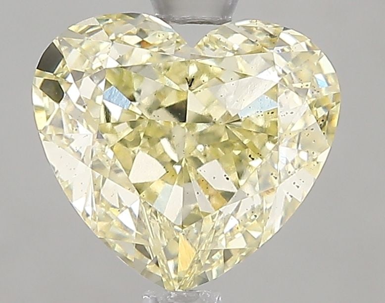 Loose Diamond - HEART 2.52ct Fancy Yellow SI1: Loose Diamond - HEART 2.52ct Fancy Yellow SI1 Source: This is a real non-mined Diamond that has been grown in a lab Shape: HEART Carats: 2.52 Color: Fancy Yellow Certification: IGI Video: