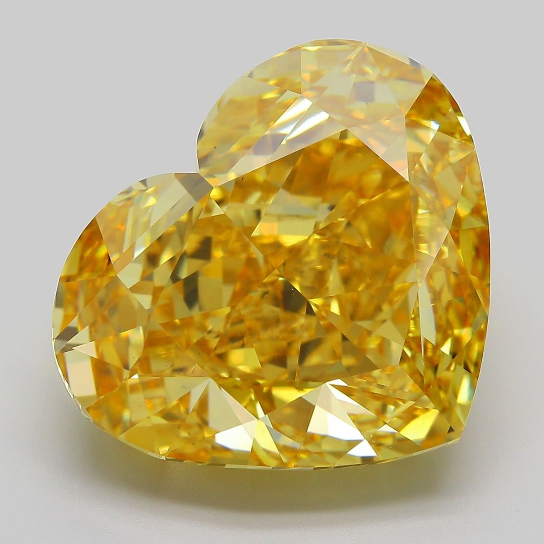 Loose Diamond - HEART 25.17ct Fancy Vivid Yellow VS1: Loose Diamond - HEART 25.17ct Fancy Vivid Yellow VS1 Source: This is a real non-mined Diamond that has been grown in a lab Shape: HEART Carats: 25.17 Color: Fancy Vivid Yellow Certification: IGI Video