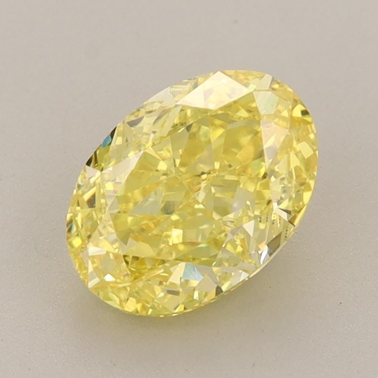 Loose Diamond - OVAL 1.56ct Fancy Vivid Yellow VS1: Loose Diamond - OVAL 1.56ct Fancy Vivid Yellow VS1 Source: This is a real non-mined Diamond that has been grown in a lab Shape: OVAL Carats: 1.56 Color: Fancy Vivid Yellow Certification: IGI Video: