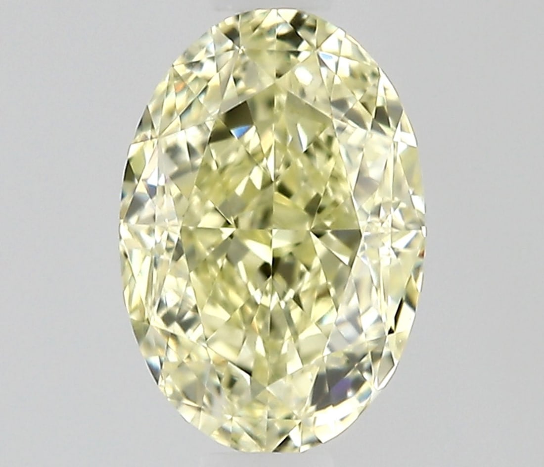 Loose Diamond - OVAL 0.7ct Fancy Light Yellow VS2: Loose Diamond - OVAL 0.7ct Fancy Light Yellow VS2 Source: Natural Shape: OVAL Carats: 0.7 Color: Fancy Light Yellow Certification: GIA Video: