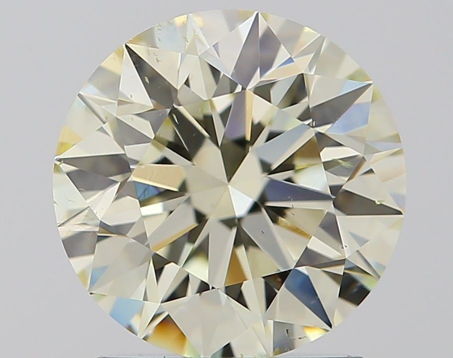 Loose Diamond - ROUND 1.71ct J SI1: Loose Diamond - ROUND 1.71ct J SI1 Source: Natural Shape: ROUND Carats: 1.71 Color: J Clarity: SI1 Certification: IGI Video:
