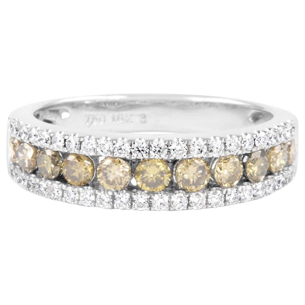 0.95ct Fancy Yellowish Brown Diamond Cocktail Ring in 18k Two-Tone Gold: 0.95ct Fancy Yellowish Brown Diamond Cocktail Ring in 18k Two-Tone Gold This exquisite cocktail ring features a stunning 0.95 ct Fancy Yellowish Brown diamond, set in a luxurious 18k two-tone gold ban