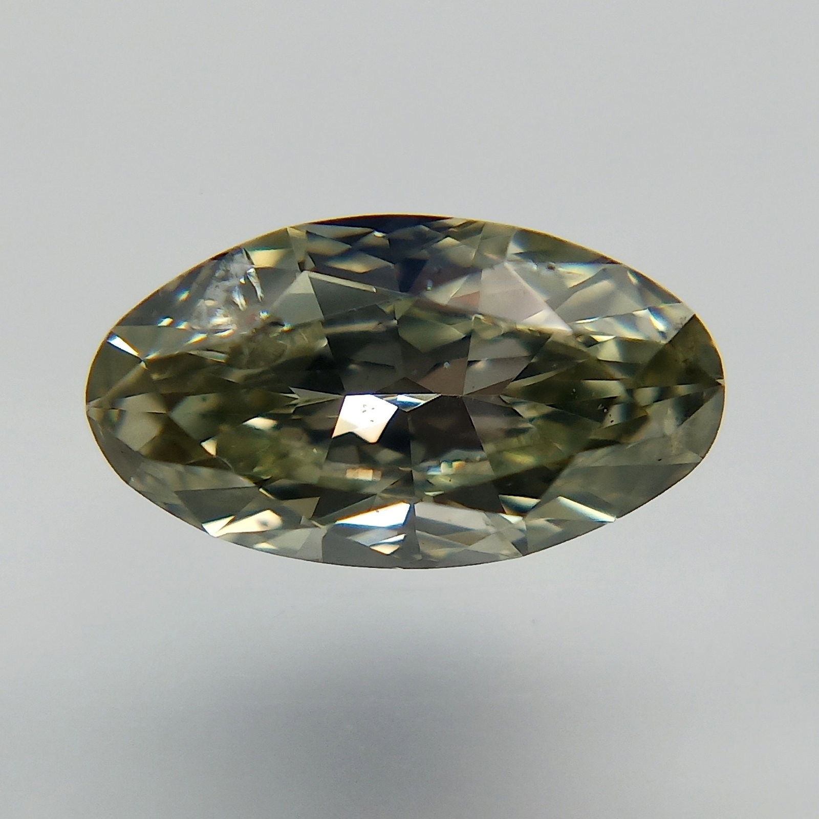 Loose Diamond - OVAL 0.44ct Fancy Grayish Yellowish Green: Loose Diamond - OVAL 0.44ct Fancy Grayish Yellowish Green Source: Natural Shape: OVAL Carats: 0.44 Color: Fancy Grayish Yellowish Green Certification: GIA The Diamond Depot Guarantee: All items in thi