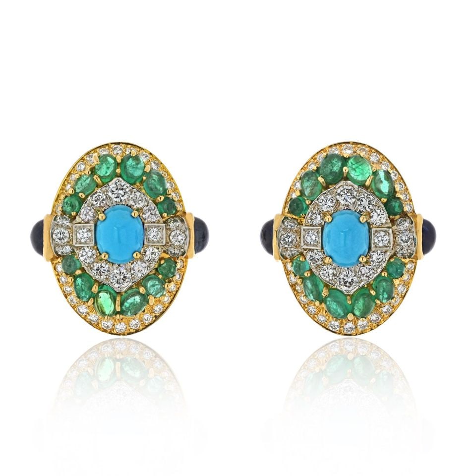 David Webb Platinum 18K Yellow Gold Turquoise Emerald Diamond Clip Earrings: David Webb Platinum 18K Yellow Gold Turquoise Emerald Diamond Clip Earrings These exquisite clip earrings by David Webb feature a stunning combination of platinum and 18K yellow gold. Adorned with vib