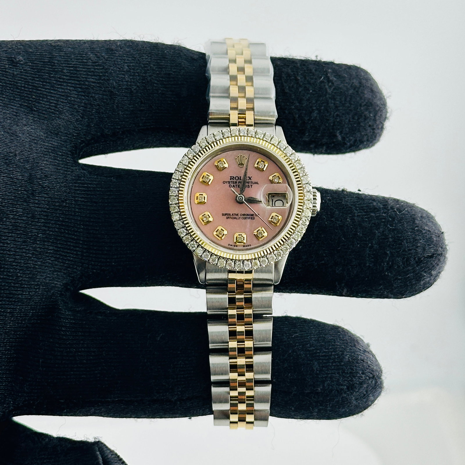 Rolex Datejust ladies watch pink MOP diamond dial Aftermarket Jubilee bracelet ref 6519: Rolex Datejust ladies watch pink MOP diamond dial Aftermarket Jubilee bracelet ref 6519 This ladies' Rolex Datejust features an aftermarket pink mother-of-pearl diamond dial and an aftermarket Jubilee