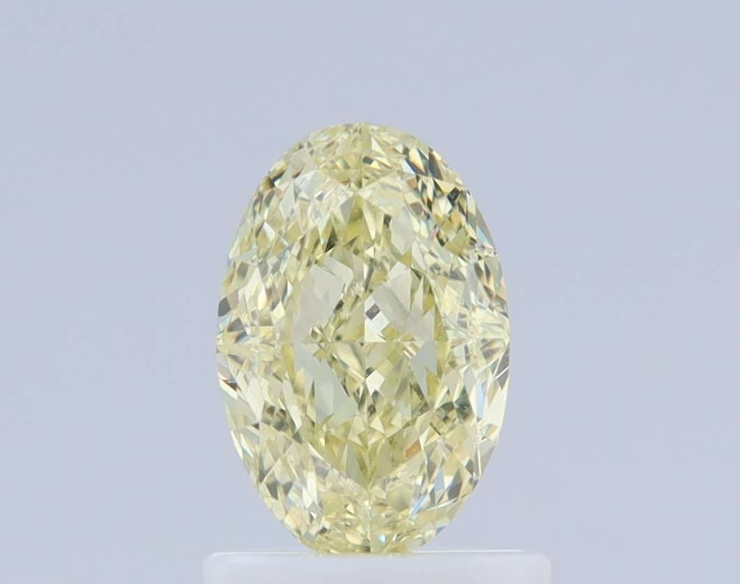 Loose Diamond - OVAL 1.01ct Fancy Light Yellow VS2: Loose Diamond - OVAL 1.01ct Fancy Light Yellow VS2 Source: Natural Shape: OVAL Carats: 1.01 Color: Fancy Light Yellow Certification: GIA Video: