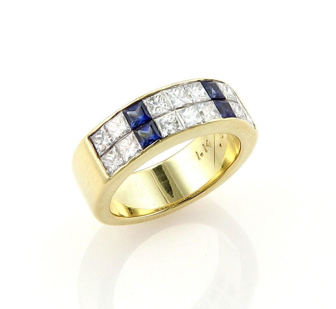 Tiffany & Co. 18k Yellow Gold Sapphire Diamond Princess Cut Ring Size 5: Tiffany & Co. 18k Yellow Gold Sapphire Diamond Princess Cut Ring Size 5 Vintage Tiffany & Co. fine ring crafted in 18k yellow gold, featuring princess cut diamonds accented with blue sapphires. It is 