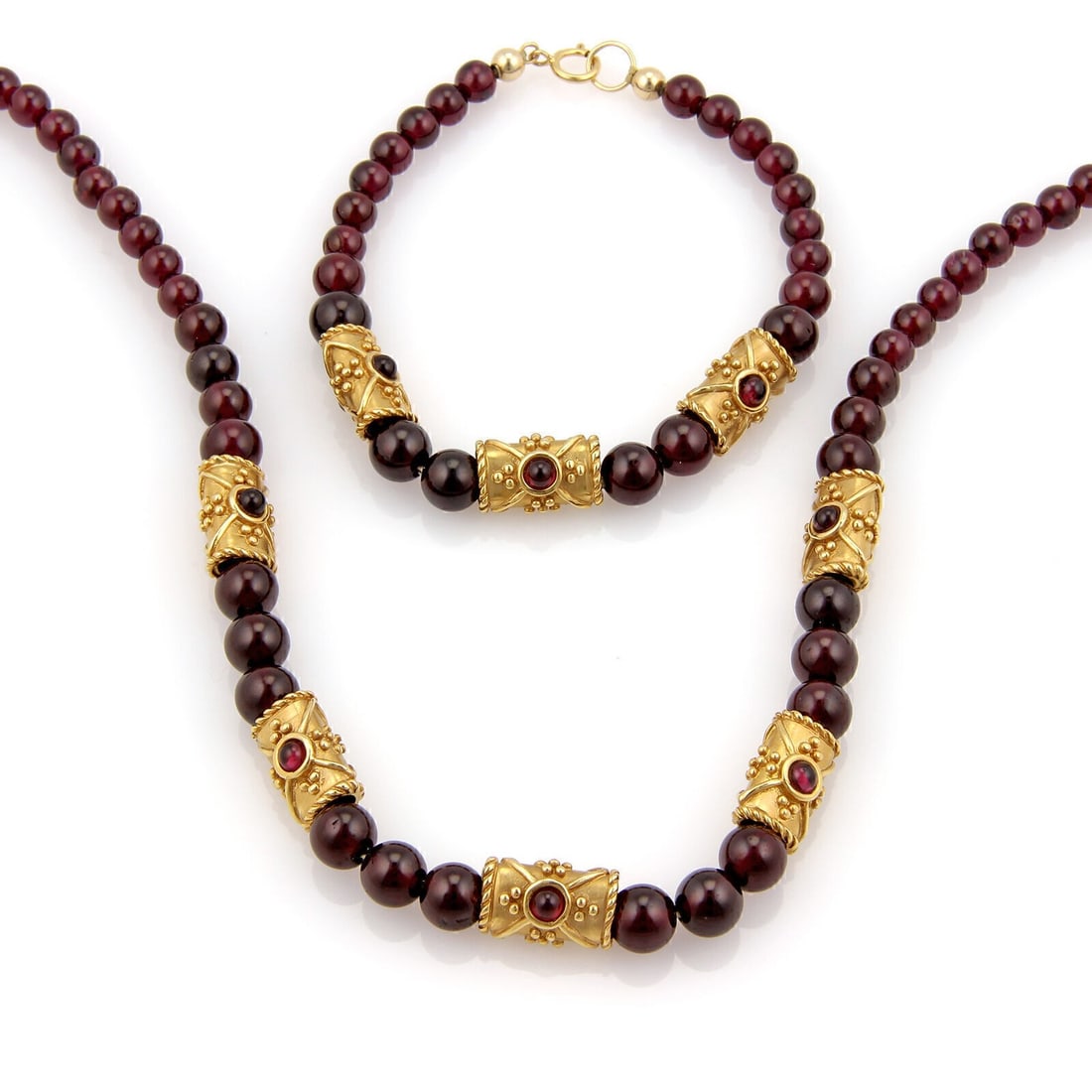 Vintage 14k Yellow Gold Rhodolite Bead Necklace Bracelet Set: Vintage 14k Yellow Gold Rhodolite Bead Necklace Bracelet Set This vintage estate jewelry set includes a necklace and bracelet crafted in 14k yellow gold with rhodolite beads and polished gold spacers.