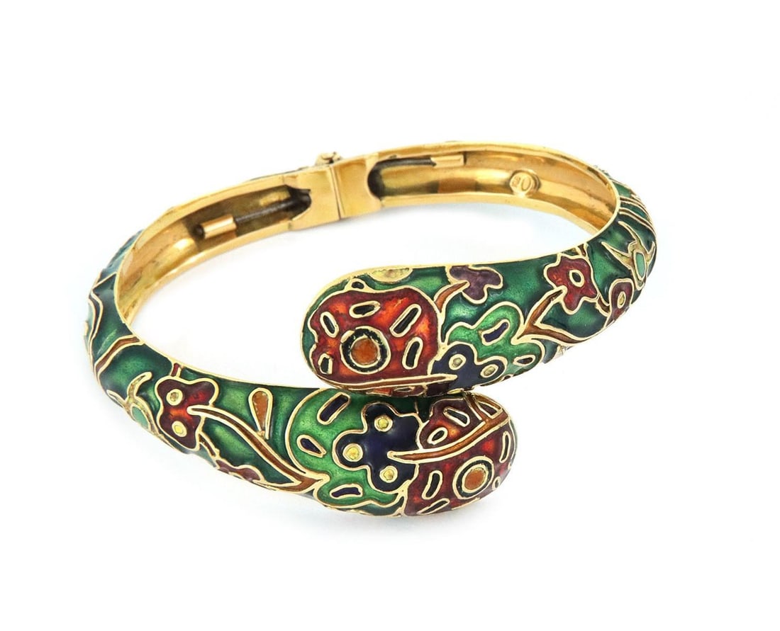Vintage 18k Yellow Gold Enamel Snake Bypass Bracelet: Vintage 18k Yellow Gold Enamel Snake Bypass Bracelet This exquisite vintage bracelet showcases a captivating flex open front design, crafted from luxurious 18k yellow gold. The centerpiece features a 