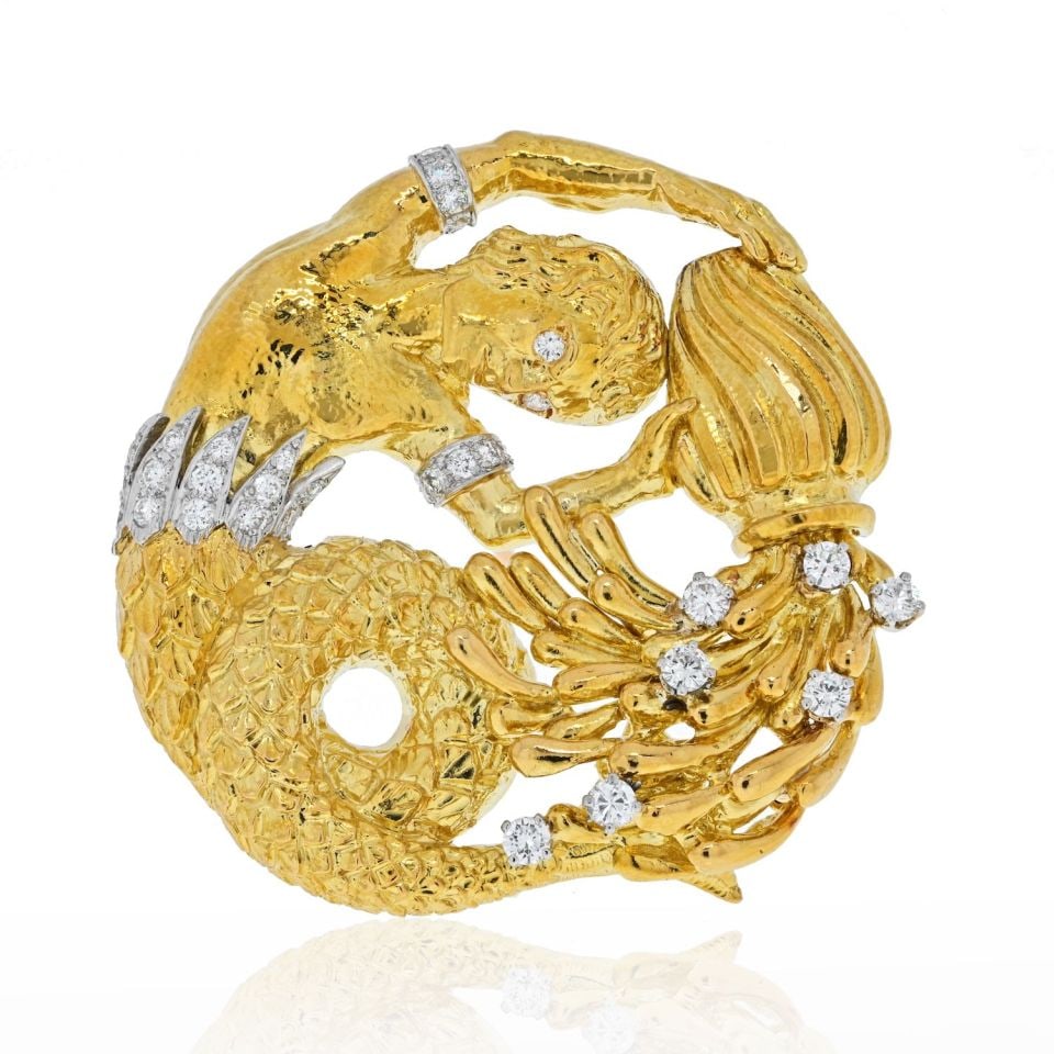 David Webb Zodiac Aquarius Pendant in Platinum & 18K Yellow Gold with Diamonds: David Webb Zodiac Aquarius Pendant in Platinum & 18K Yellow Gold with Diamonds This stunning circular-shaped Aquarius zodiac pendant by David Webb is a perfect blend of luxury and astrological charm. 