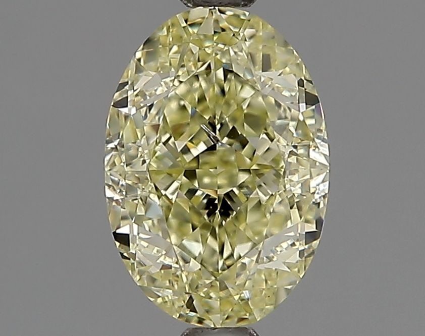 Loose Diamond - OVAL 1.53ct Fancy Yellow SI2: Loose Diamond - OVAL 1.53ct Fancy Yellow SI2 Source: Natural Shape: OVAL Carats: 1.53 Color: Fancy Yellow Certification: GIA Video: