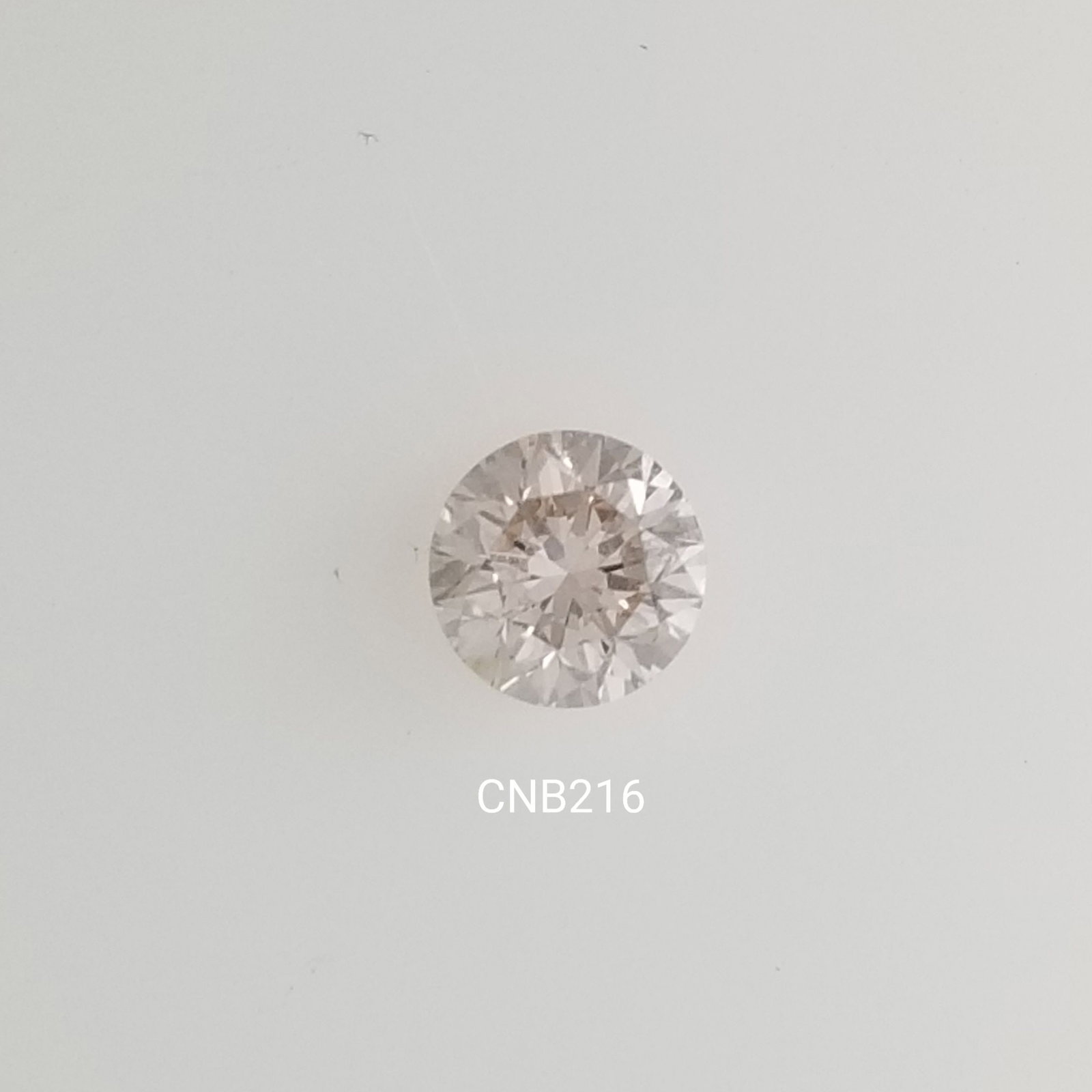 Loose Diamond - ROUND 0.58ct Very Light Brown VS2: Loose Diamond - ROUND 0.58ct Very Light Brown VS2 Source: Natural Shape: ROUND Carats: 0.58 Color: Very Light Brown Certification: NONE The Diamond Depot Guarantee: All items in this auction are guara