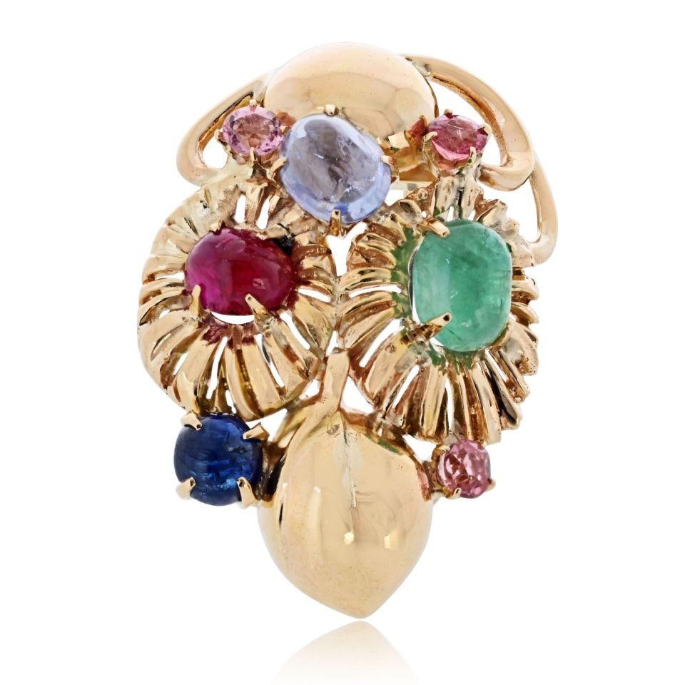 Seaman Schepps 18K Yellow Gold Gemstone Vintage Brooch 1.75 x 1.25 inches: Seaman Schepps 18K Yellow Gold Gemstone Vintage Brooch 1.75 x 1.25 inches This stunning vintage brooch by Seaman Schepps showcases the designer's signature bold and colorful artistry. Made from 18K ye