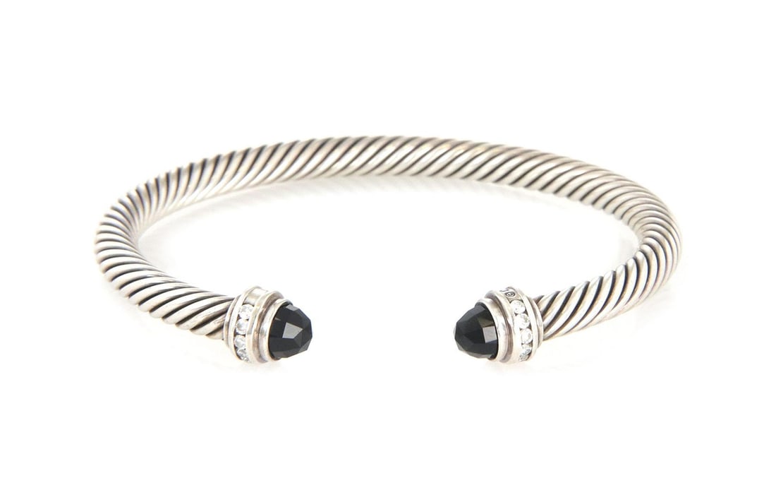 David Yurman Diamond Onyx Sterling Silver 5mm Cable Cuff Bracelet: David Yurman Diamond Onyx Sterling Silver 5mm Cable Cuff Bracelet This exquisite cuff bracelet by David Yurman is an authentic piece crafted from sterling silver. It features a 5mm thick cable wire ba