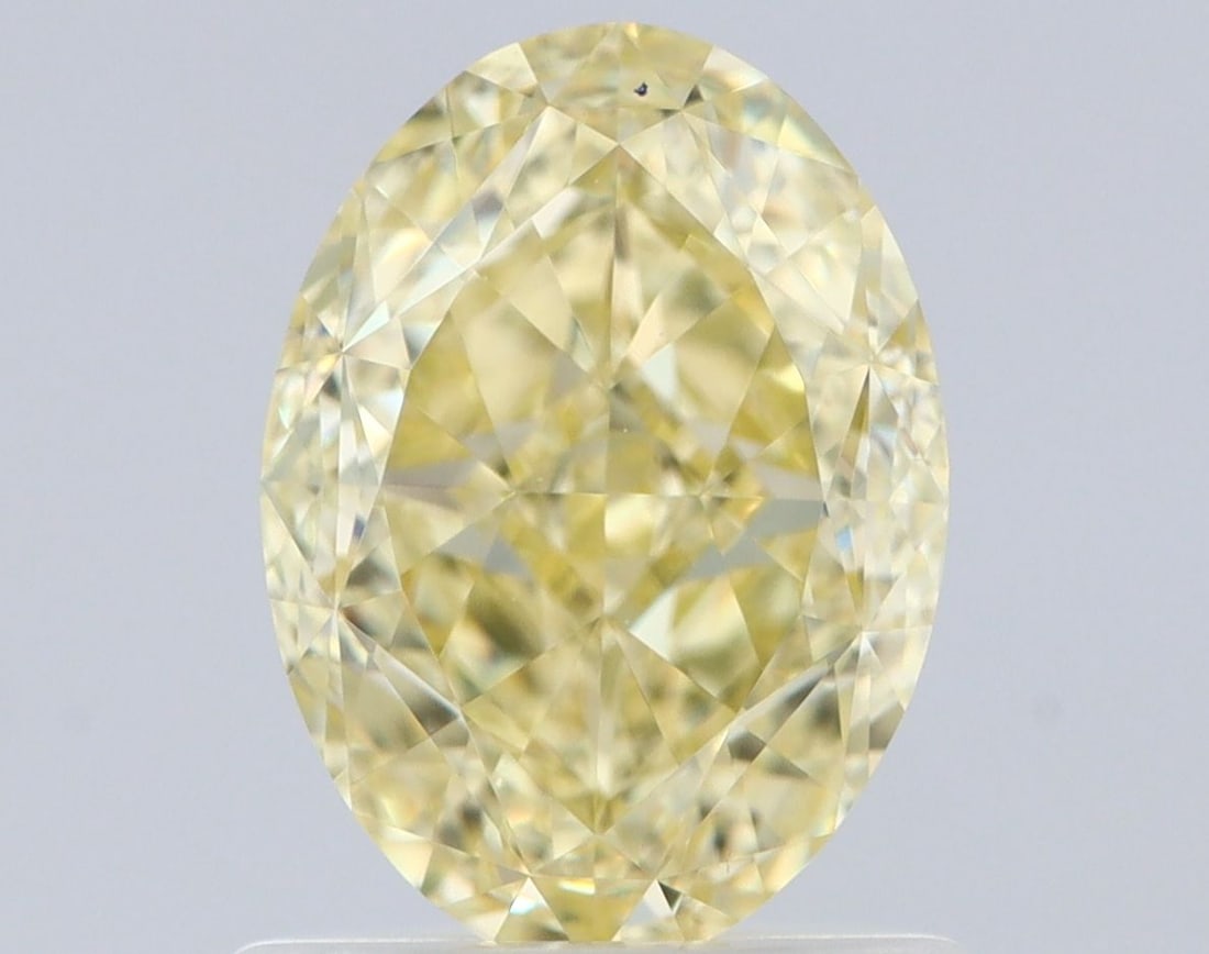 Loose Diamond - OVAL 1.22ct Fancy Light Yellow VVS2: Loose Diamond - OVAL 1.22ct Fancy Light Yellow VVS2 Source: Natural Shape: OVAL Carats: 1.22 Color: Fancy Light Yellow Certification: GIA Video: