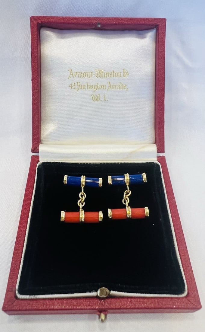 M M French 18k Gold Coral Lapis Lazuli Cufflinks Pair: M M French 18k Gold Coral Lapis Lazuli Cufflinks Pair This elegant pair of French cufflinks is crafted from 18k yellow gold and features vibrant orange coral as the main stone, accented by lapis lazul