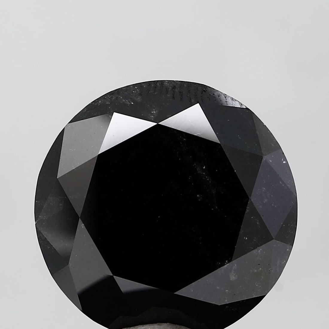 Loose Diamond - ROUND 17.75ct Black VVS2: Loose Diamond - ROUND 17.75ct Black VVS2 Source: Natural Shape: ROUND Carats: 17.75 Color: Black Certification: NONE Video: