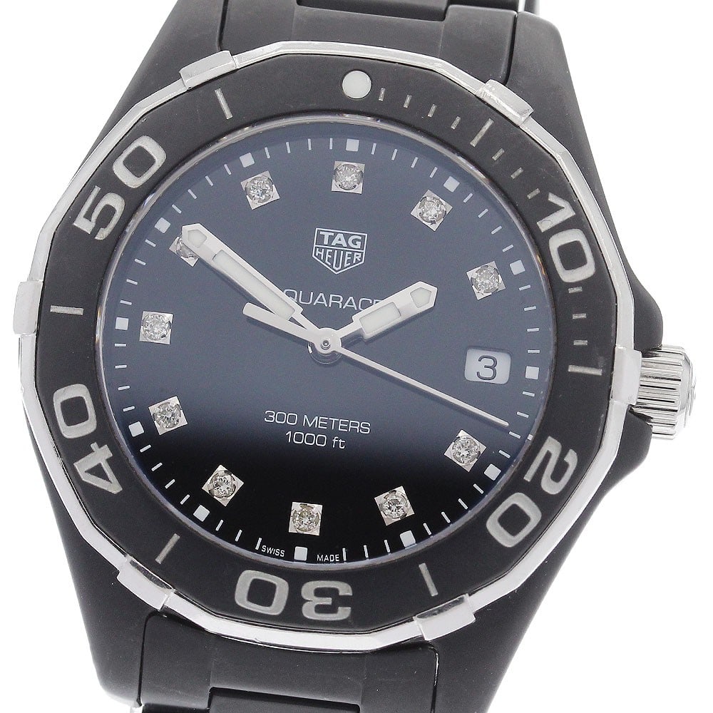 TAG HEUER Aquaracer WAY1397 Women's Quartz Wristwatch with Date 11 Diamonds: TAG HEUER Aquaracer WAY1397 Women's Quartz Wristwatch with Date 11 Diamonds TAG HEUER Aquaracer women's quartz wristwatch with date function and 11 diamonds. This pre-owned Swiss-made watch is present
