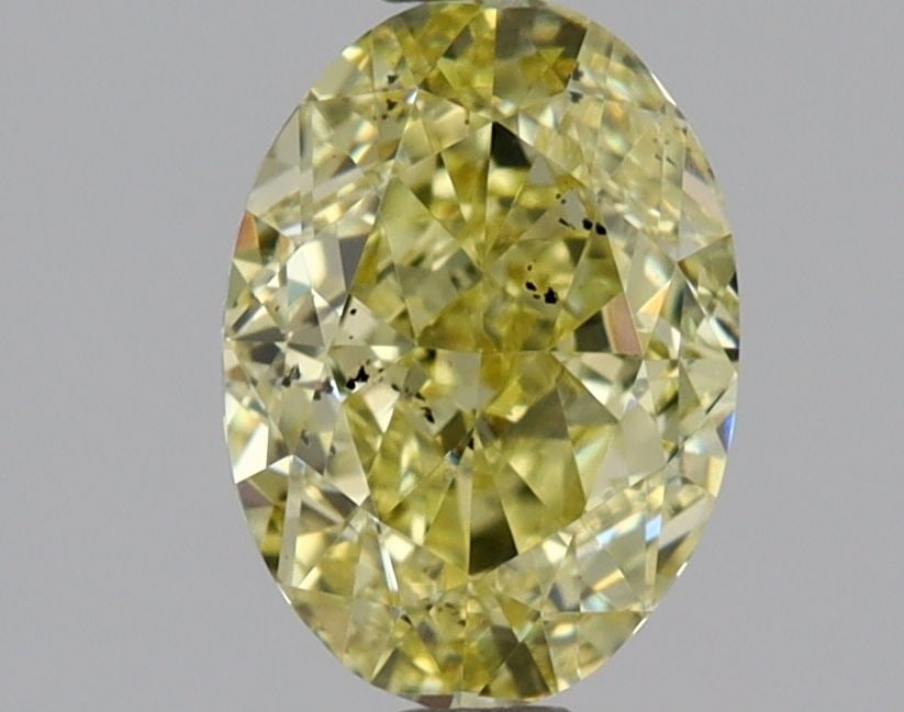 Loose Diamond - OVAL 1.0ct Fancy Yellow SI2: Loose Diamond - OVAL 1.0ct Fancy Yellow SI2 Source: Natural Shape: OVAL Carats: 1.0 Color: Fancy Yellow Certification: GIA Video: