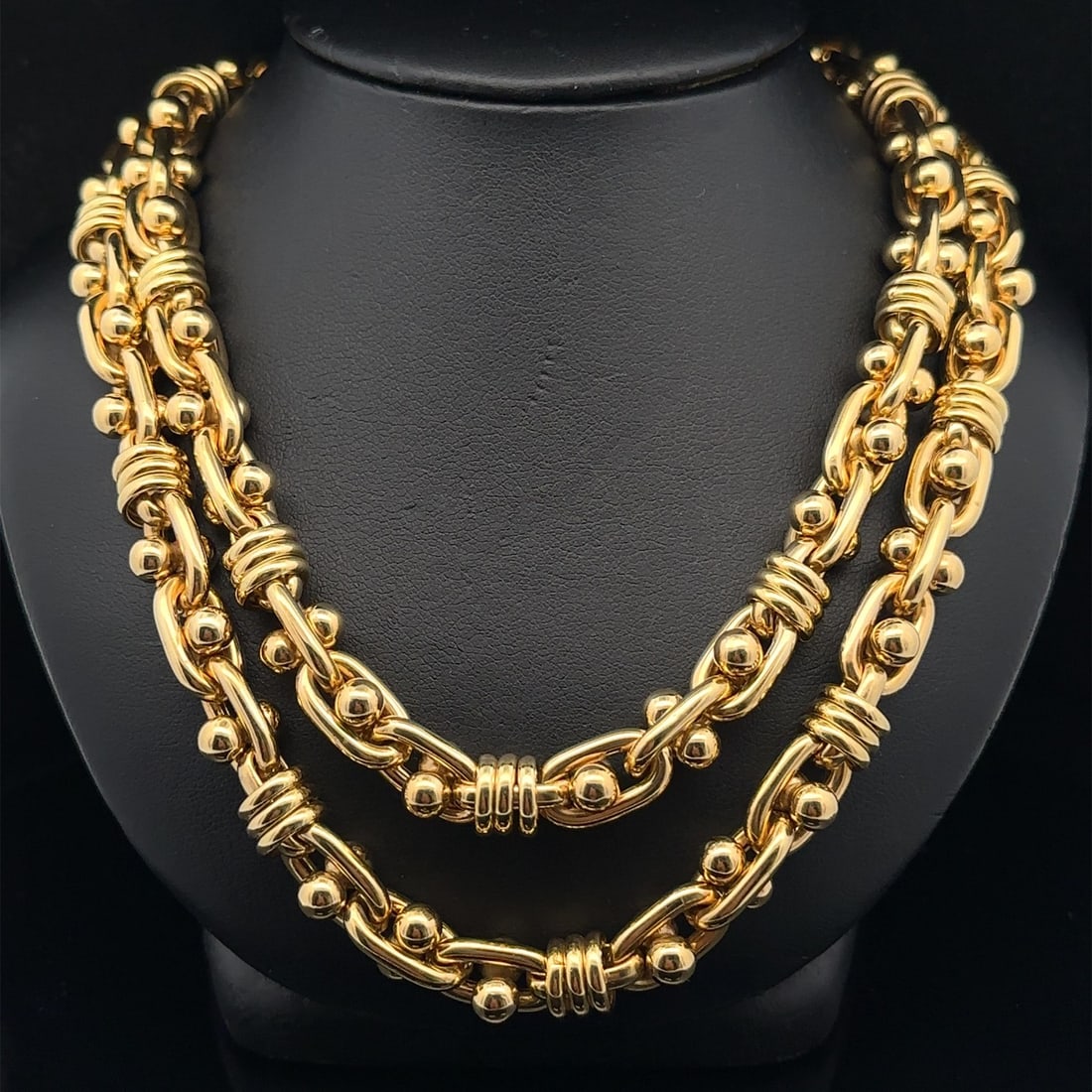 18k Yellow Gold 30 Inch Open Link Chain Necklace with Bead Ball Details: 18k Yellow Gold 30 Inch Open Link Chain Necklace with Bead Ball Details This stunning necklace features a substantial open link design crafted from solid 18k yellow gold. Measuring an impressive 30 in
