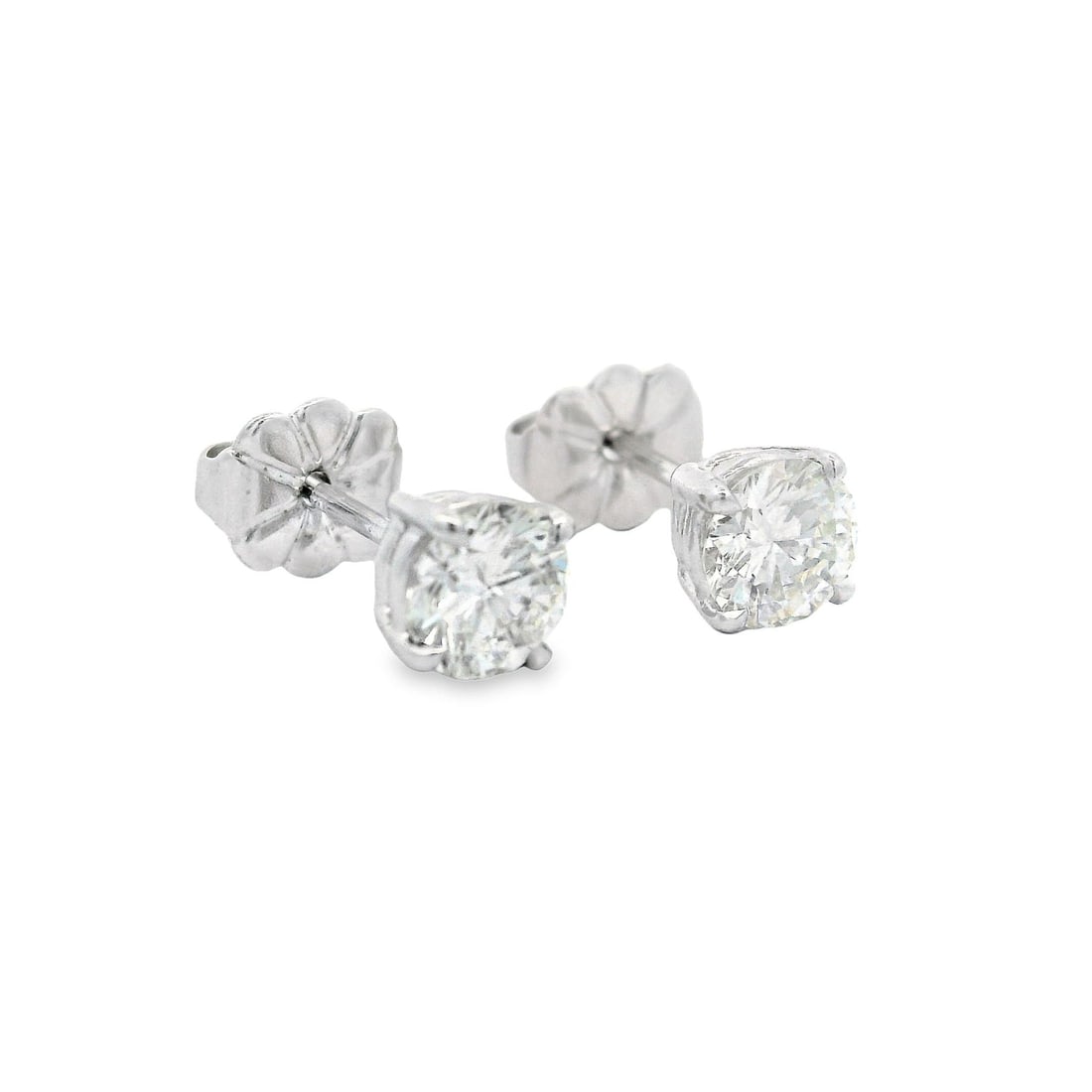 Elegant 14k White Gold 0.77ct Diamond Stud Earrings: Elegant 14k White Gold 0.77ct Diamond Stud Earrings Elevate your elegance with these classic stud earrings crafted in solid 14k white gold. Featuring two natural genuine diamonds, each cut into a roun
