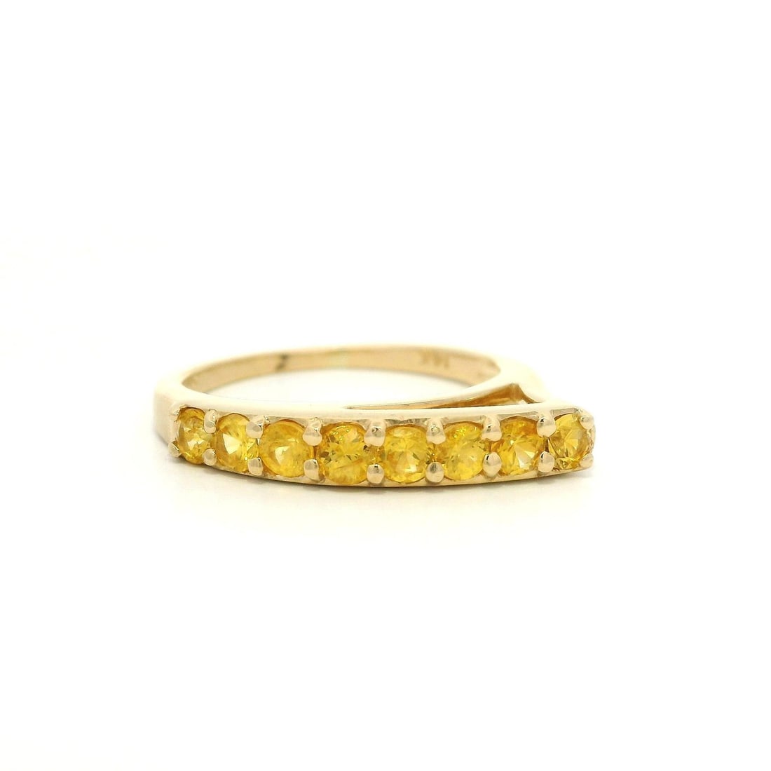 14k Yellow Gold 1ctw Vivid Yellow Sapphire Geometric Band Ring: 14k Yellow Gold 1ctw Vivid Yellow Sapphire Geometric Band Ring This exquisite band ring features a striking abstract geometric design, crafted from solid 14k yellow gold. It is adorned with eight natu