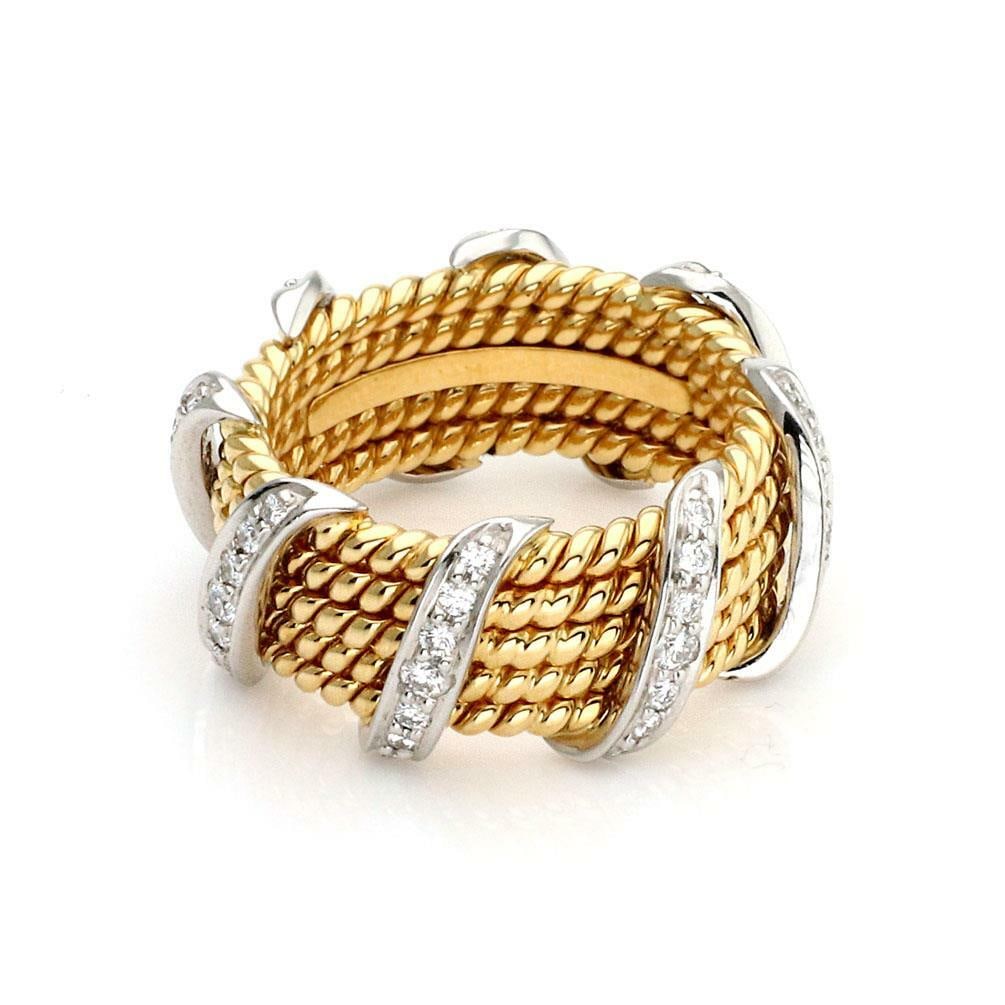 Tiffany & Co. Schlumberger 18k Gold Diamond Ring 0.79ct 5 Row Band: Tiffany & Co. Schlumberger 18k Gold Diamond Ring 0.79ct 5 Row Band This exquisite Tiffany & Co. Schlumberger diamond ring features a stunning design with five rows of wire stacked bands. Crafted from 