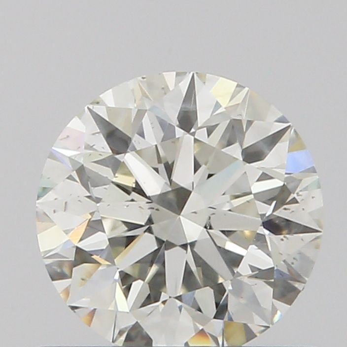 Loose Diamond - ROUND 0.7ct J SI1: Loose Diamond - ROUND 0.7ct J SI1 Source: Natural Shape: ROUND Carats: 0.7 Color: J Clarity: SI1 Certification: GIA Video: