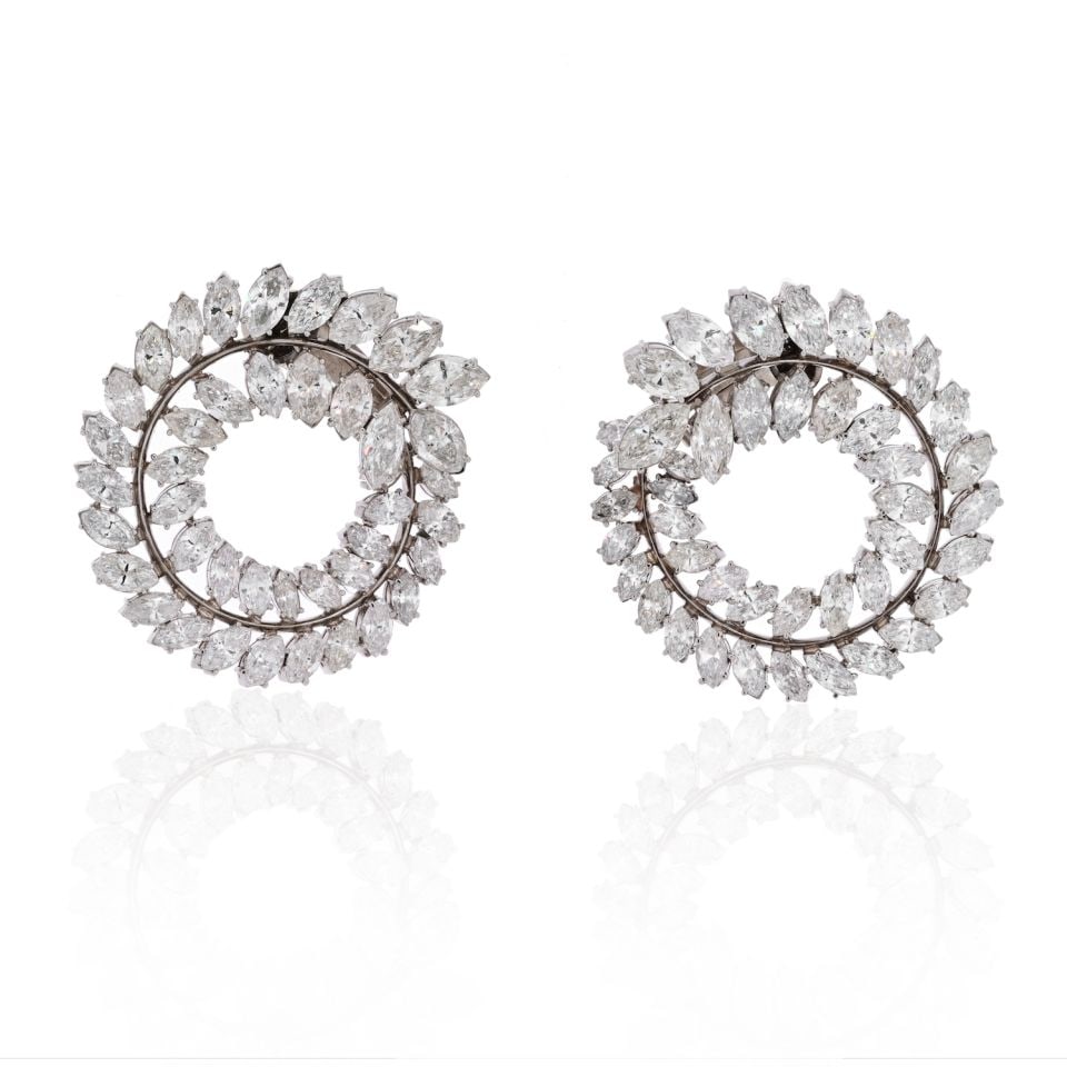 Platinum 30 Carat Marquise Diamond Swirl Earrings: Platinum 30 Carat Marquise Diamond Swirl Earrings Platinum 30 Carat Marquise Diamond Swirl Earrings These exquisite earrings feature a luxurious design, showcasing a stunning array of 86 marquise cut 