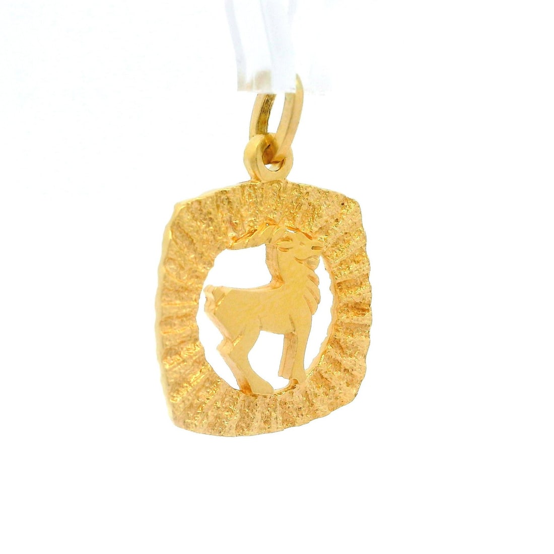 Zodiac 18k Yellow Gold Capricorn Medallion Charm Pendant: Zodiac 18k Yellow Gold Capricorn Medallion Charm Pendant This exquisite Unisex 18k Yellow Gold Capricorn Zodiac Textured Frame Medallion Charm Pendant embodies elegance and astrological significance. 