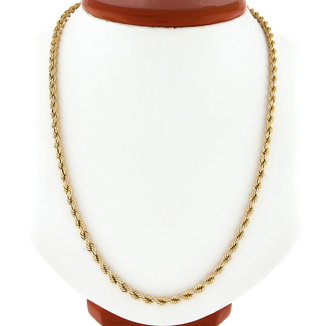 14K Yellow Gold Rope Chain Necklace 20.5 Inch 4mm Barrel Clasp: 14K Yellow Gold Rope Chain Necklace 20.5 Inch 4mm Barrel Clasp This unisex solid rope chain necklace is crafted from 14k yellow gold, offering a bold and classic look. The chain measures 20.5 inches i