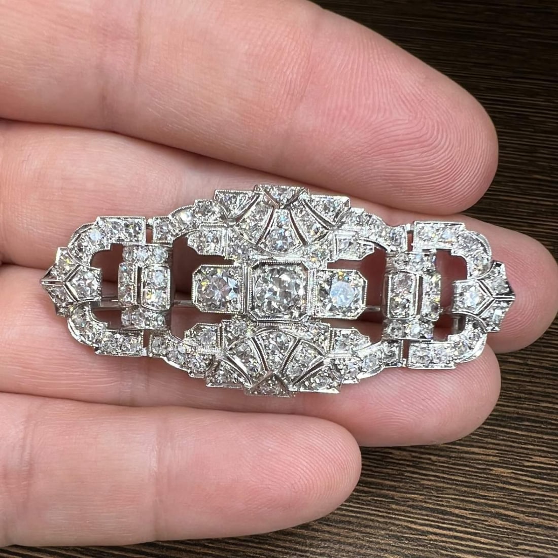 Art Deco 4.30 Ct Diamond Brooch with 80 Accent Diamonds: Art Deco 4.30 Ct Diamond Brooch with 80 Accent Diamonds This stunning Art Deco brooch features a total diamond weight of 4.30 Ct. The piece is elegantly designed with three main diamonds weighing appr